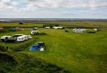 Cars, campervans and motorhomes at Iceland campsite
